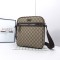 Gucci GG  Monogram Canvas Coated Messenger Bag